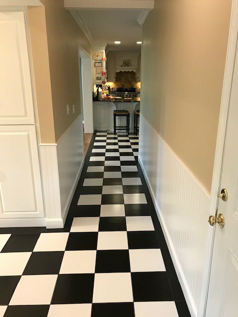 black and white tile hallway